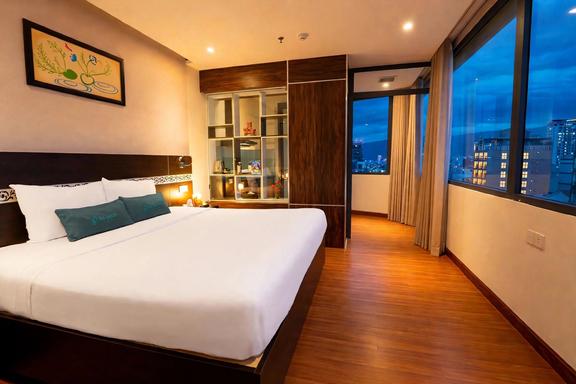 Apartment bed and wardrobe at Sea Garden Hotel Da Nang